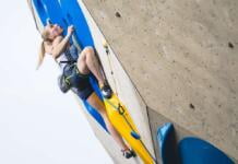 Janja Garnbret on an indoor climbing wall.